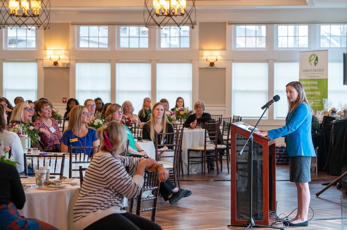 Conference attendees listening to speaker