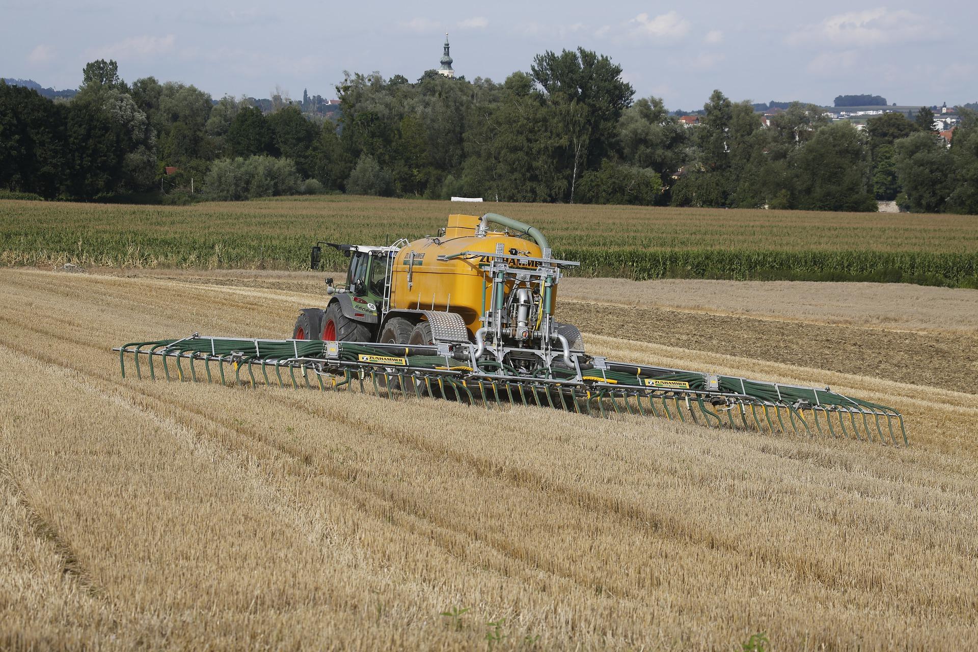 Farm equipment spreading liquid manure